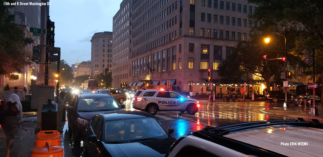 Police in the rain 15th and K Street